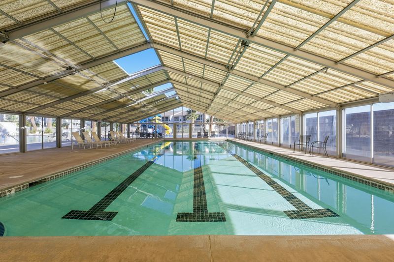 Covered indoor lap pool with swim lanes